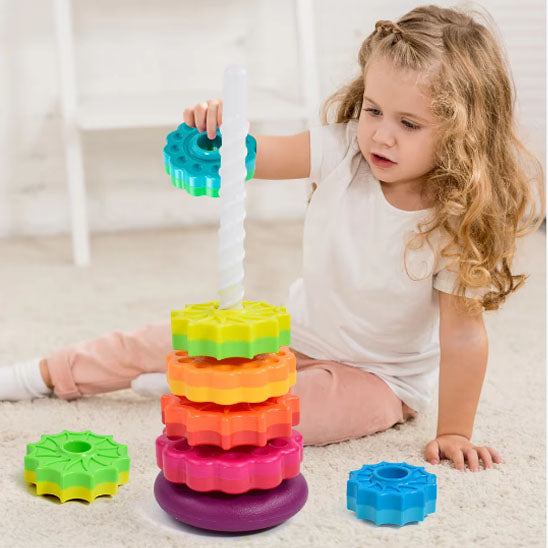 enfant joue jouet bebe 1 an tour arc-en-ciel