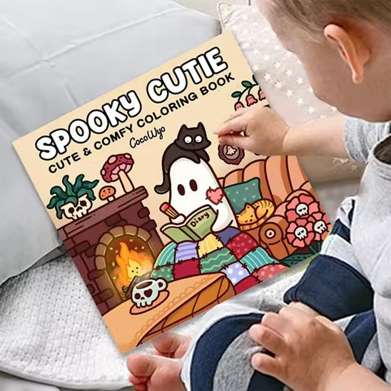 enfant regarde livre de coloriage modèle beige