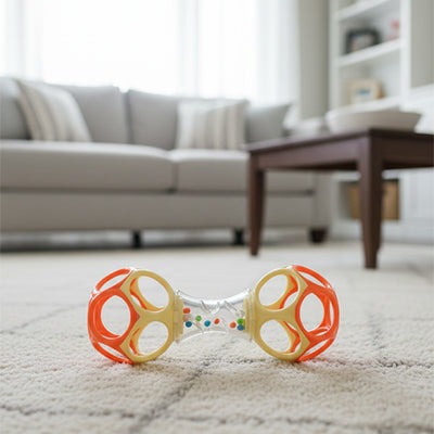 hochet pour bebe posait tapis au sol