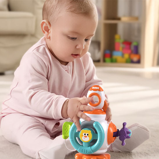 bébé fille joue cube d'activité bébé fusée interactive
