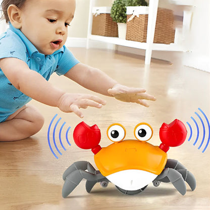 jouet bébé 6 mois orange crabe rampant